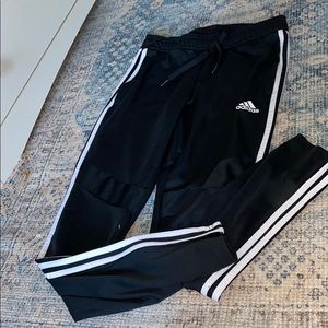 Black adidas sweat pants/ joggers.